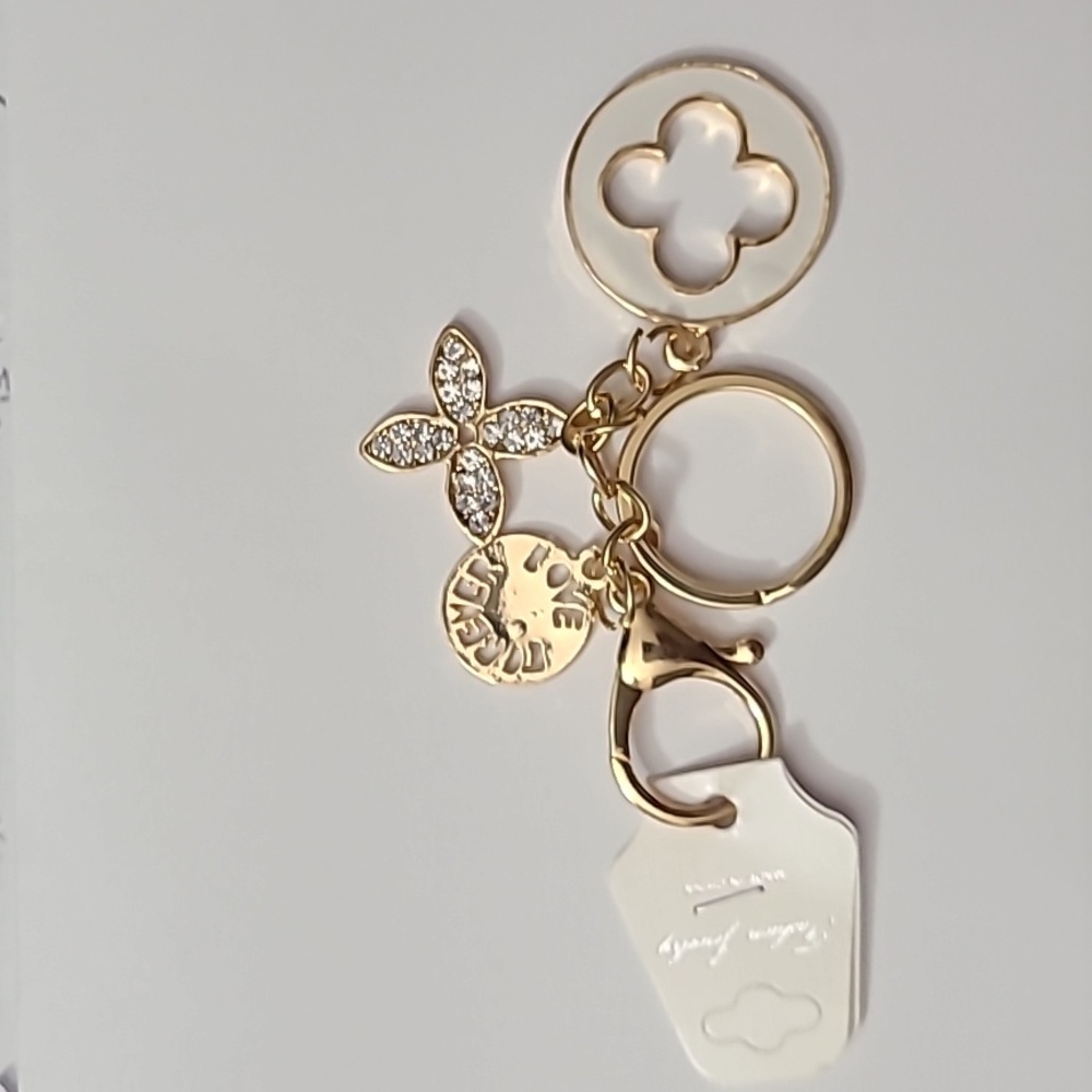 Gold and Sparkling Clear gems 💎 Purse/key tag with Forever Love and Emblem 💎
